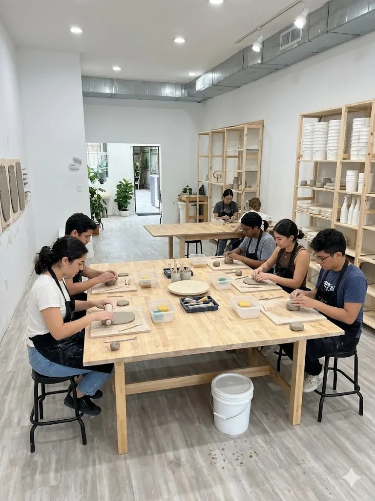 Group celebrating at pottery studio